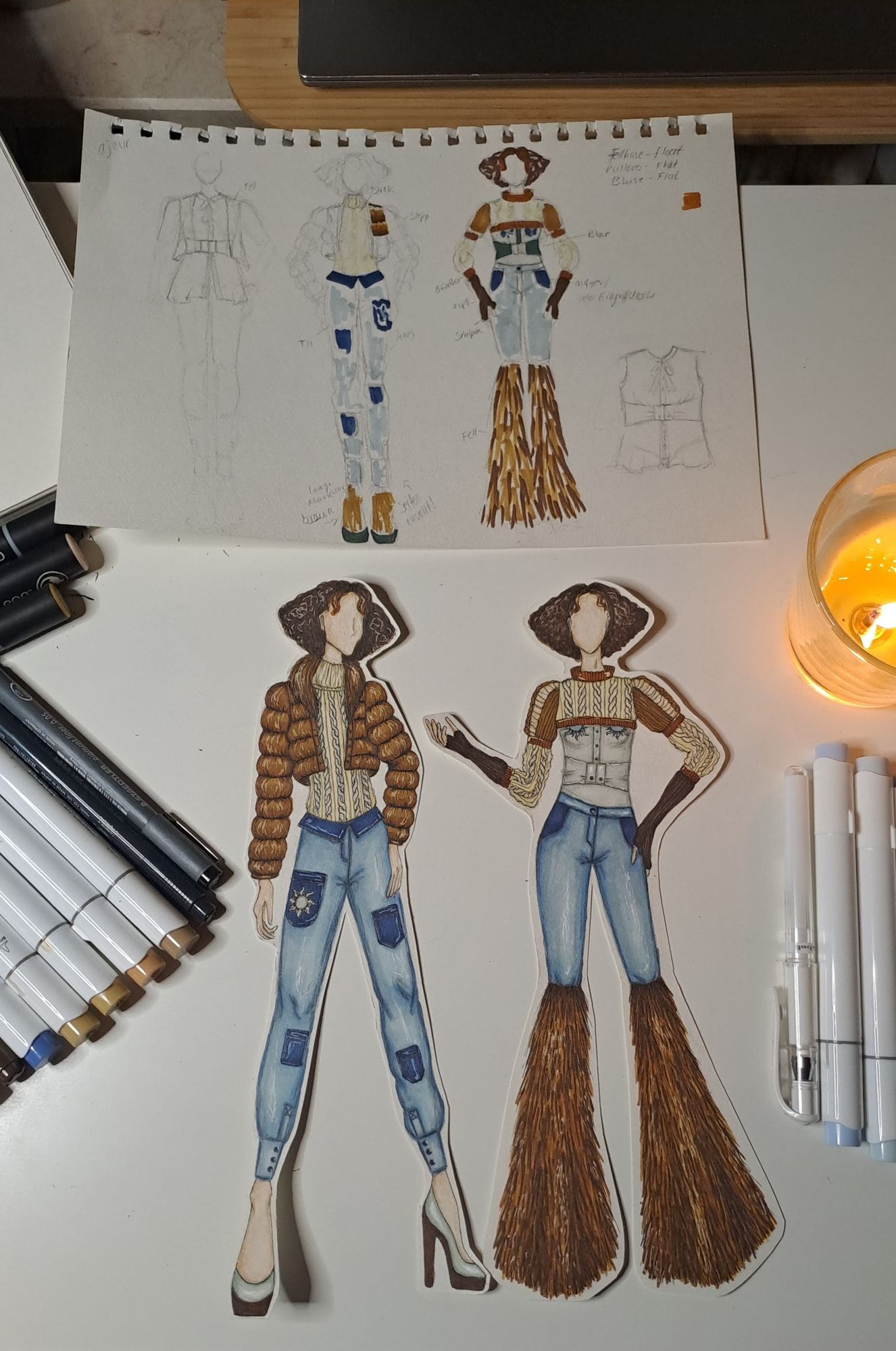 Modezeichnung - eine Modeskizze zur Darstellung von Fell, Daunenjacken und Jeans.